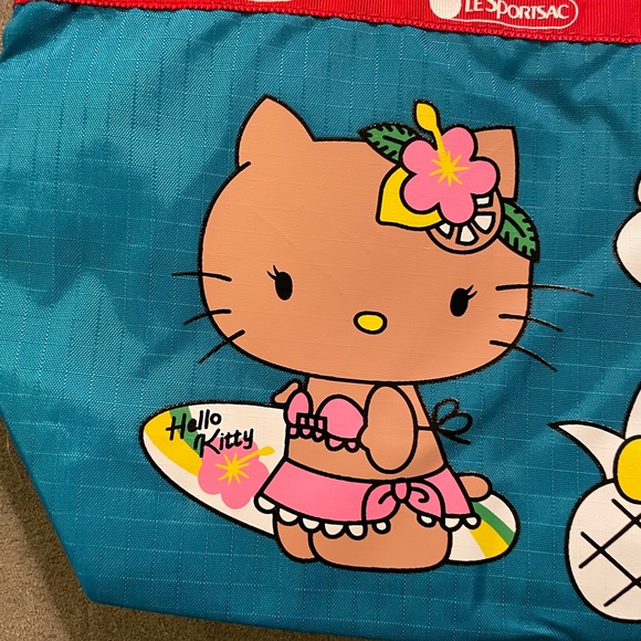 NWT HELLO KITTY X LESPORTSAC HAWIIAN WRISTLET - Picture 3 of 6